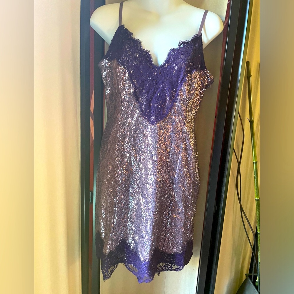 NWT Size medium light Purple Sequinned Mini Dress. Adjustable Spaghetti Straps.